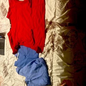 Scrubs in sky blue , pretty blue LOL and there are 4- not 1 by 1 but in a bundle